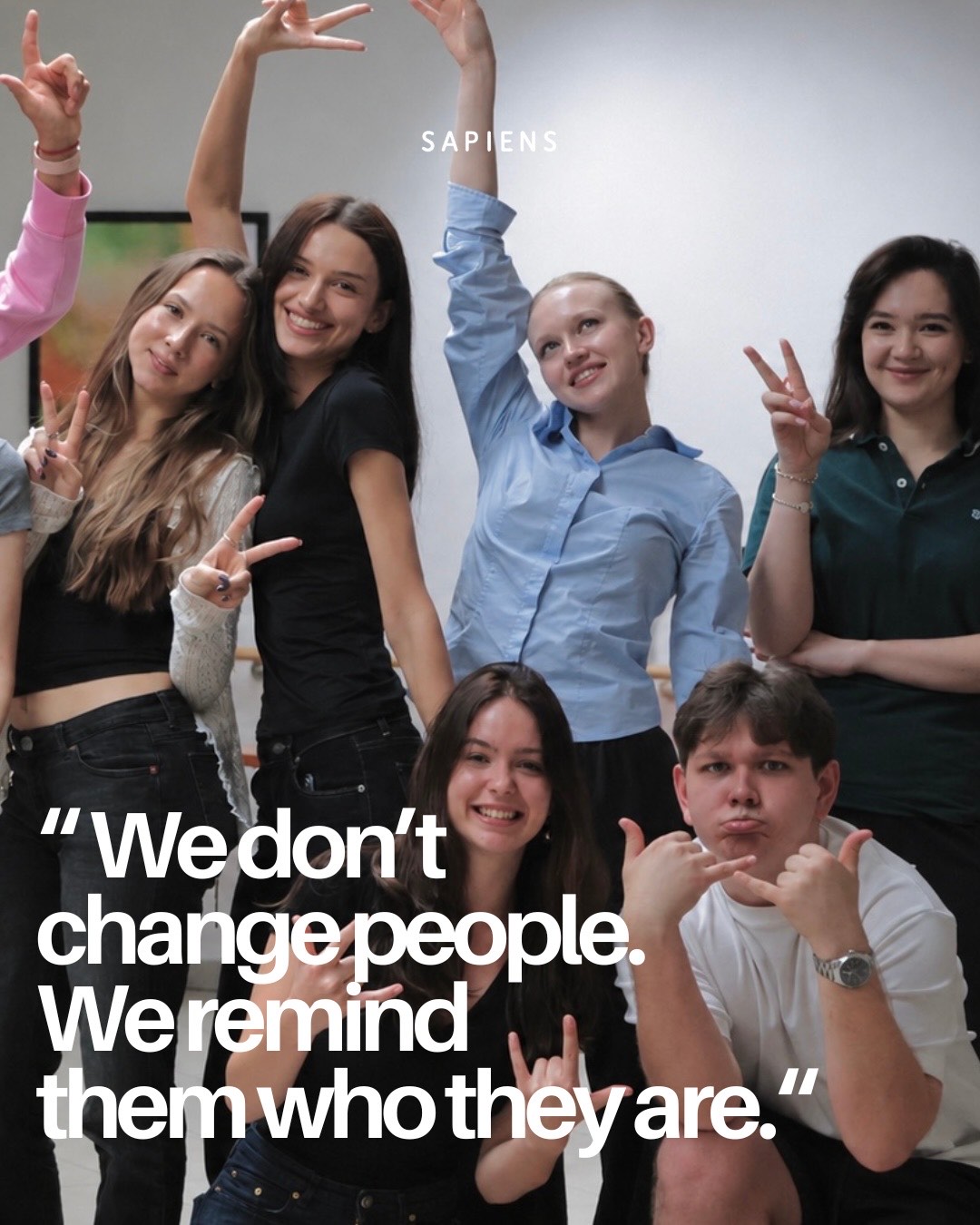The Sapiens team posing together — “We don’t change people. We remind them who they are.”